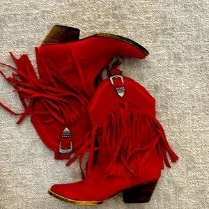 Bright red volatile cowboy boat. Full length very fun and flashy.